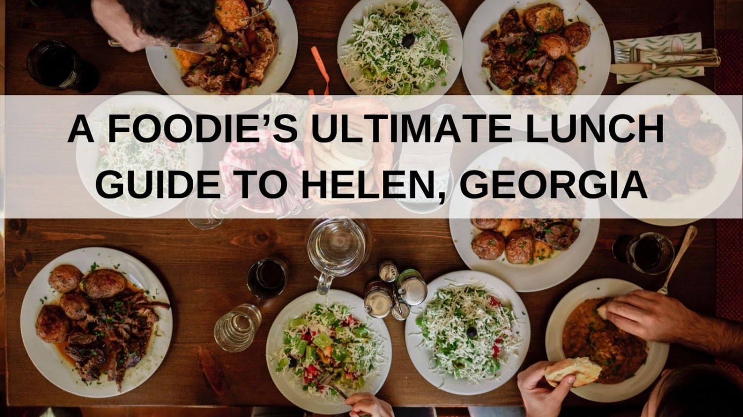 Table shot overhead with plates, banner overlay reads "A Foodie's Ultimate Lunch Guide to Helen, Georgia"